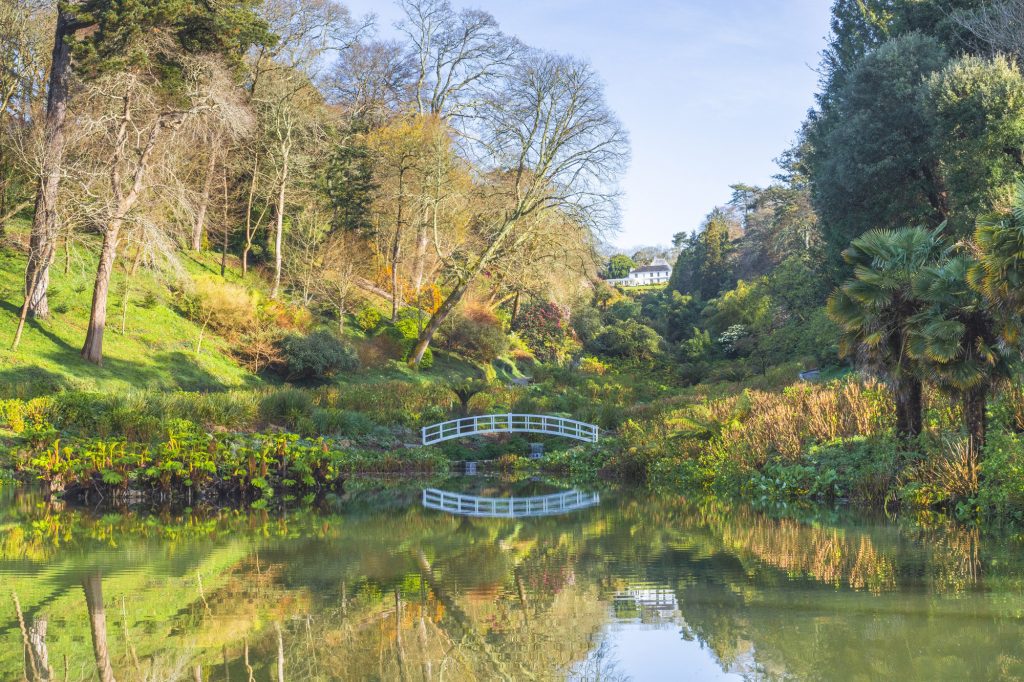 Bridge and hosue view in early spring at trebah