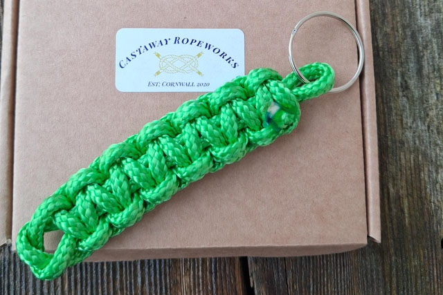 Green keyring made from fishing nets