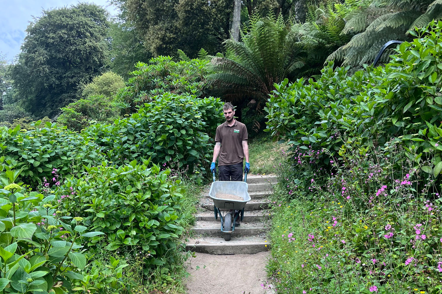 Trebah Gardener with wheelbarrow