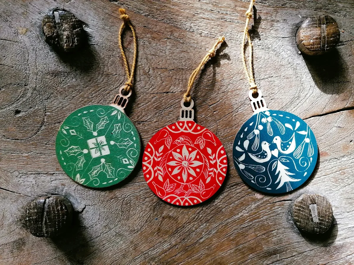 Three coloured handmade baubles