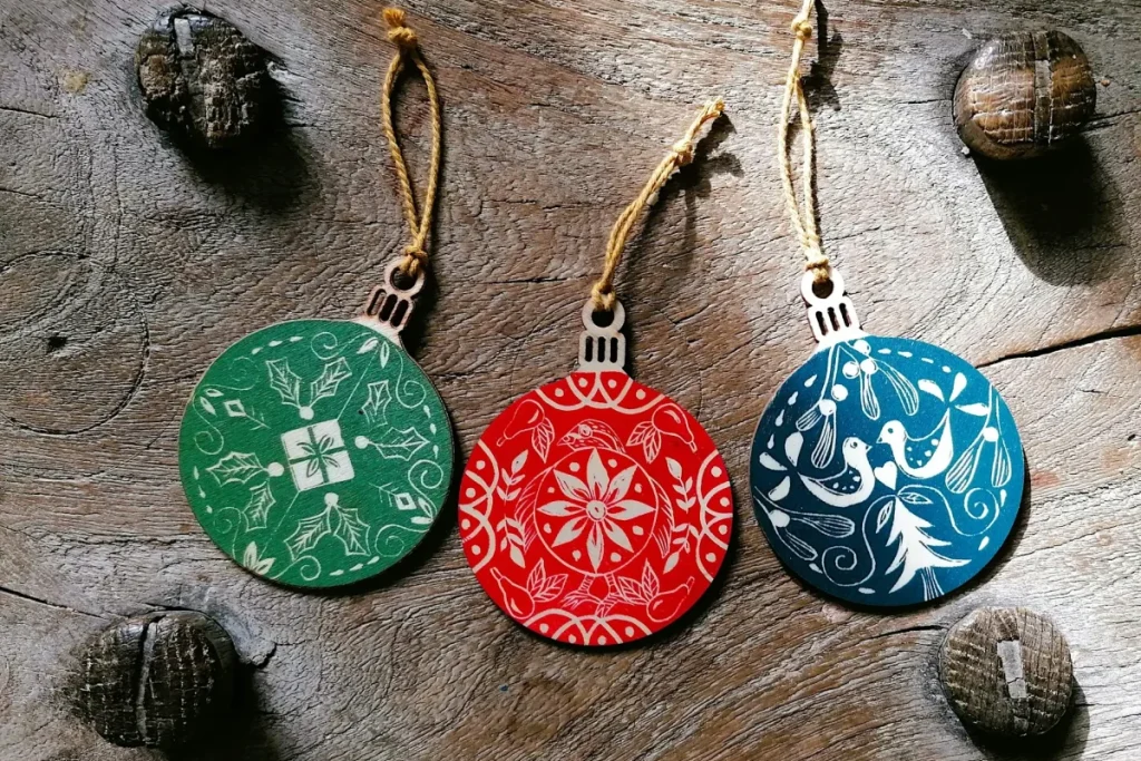 Three coloured handmade baubles